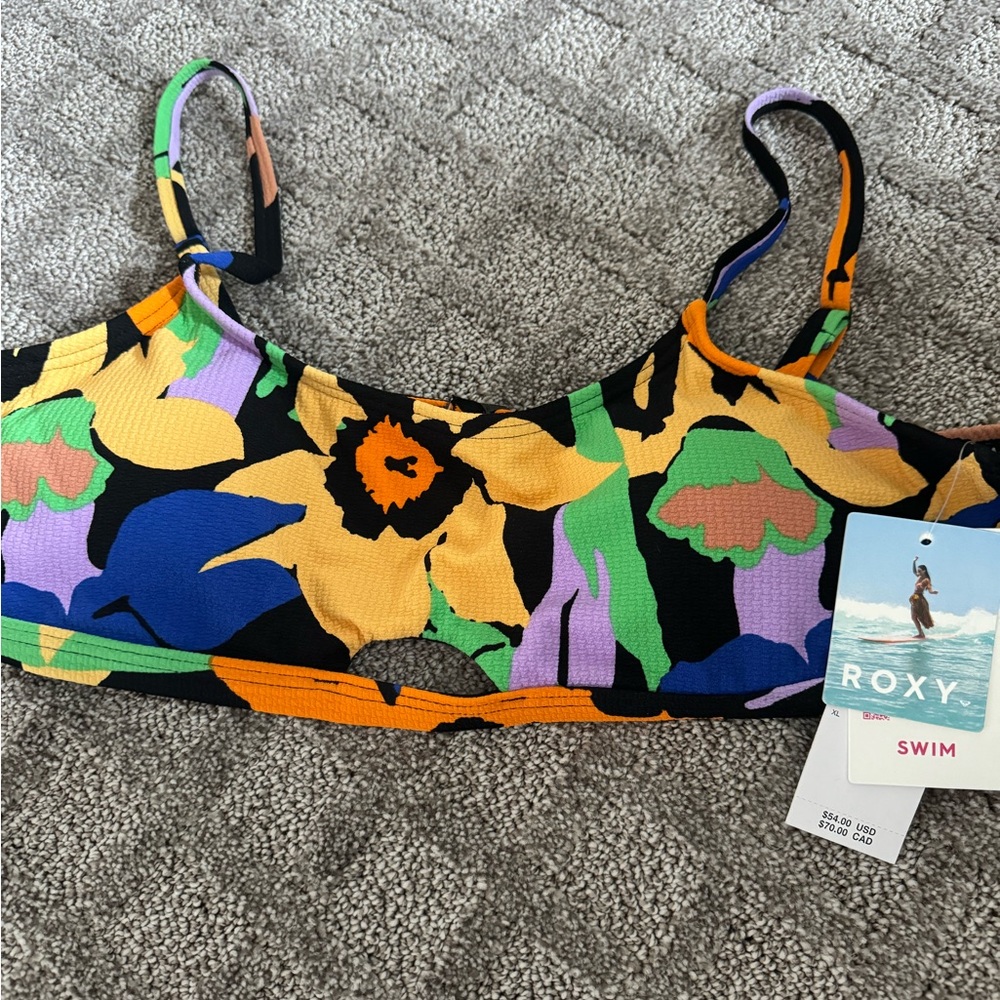 Brand new Roxy swim top. Never worn